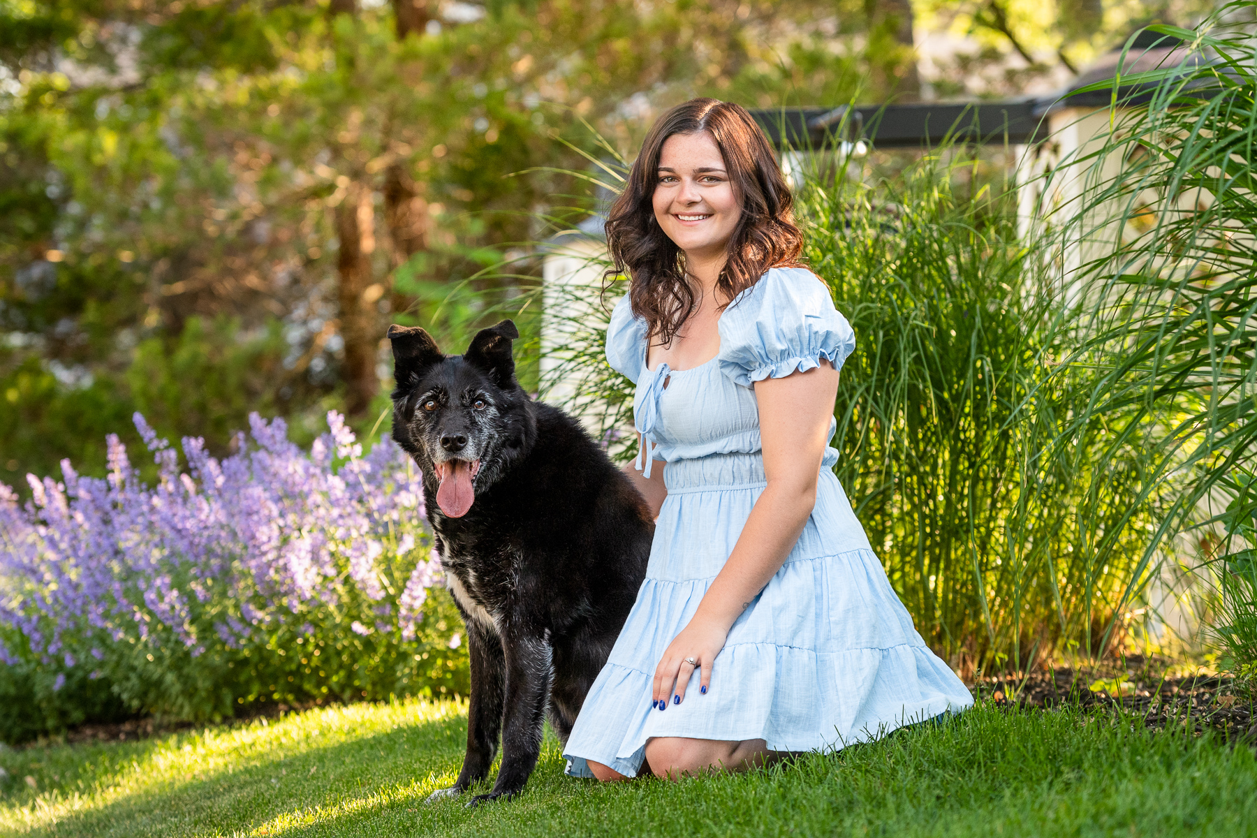 Final image from Tailwagger Dog Photography of a woman and her senior dog in front of lavender.